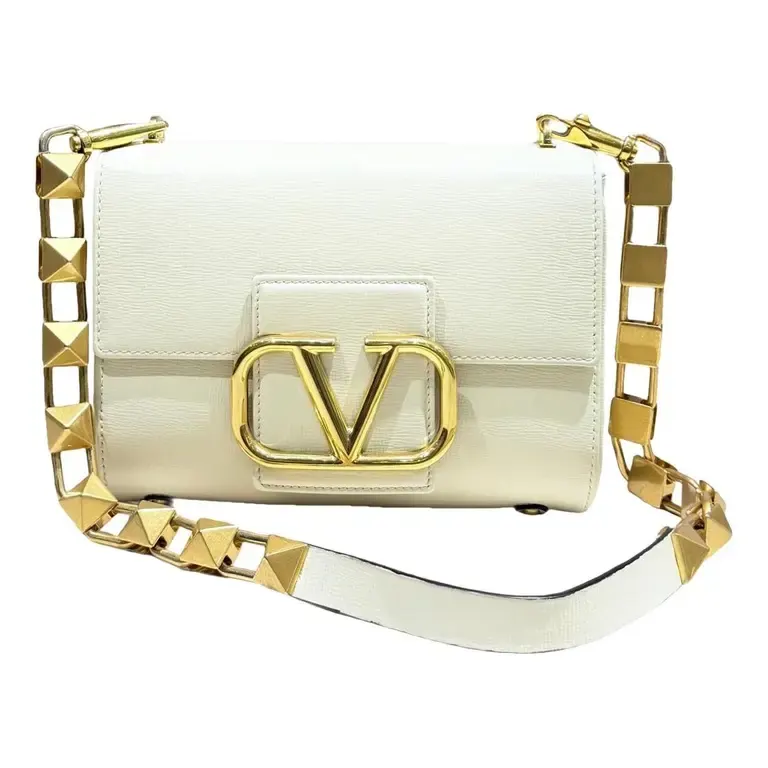 Valentino · Stud Sign — resale reference