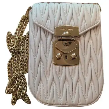 Miu Miu · Confidential — resale reference